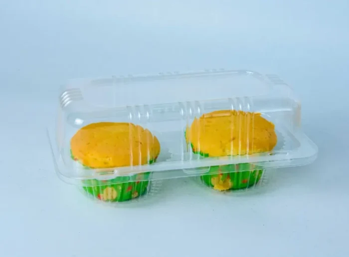 Double muffin clear packaging by JC Packaging, featuring two delicious muffins, accentuating the product with perfect clarity.