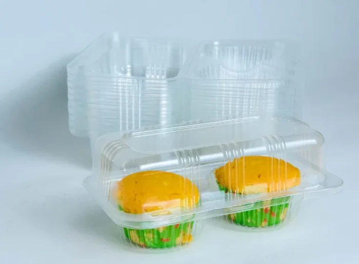 Savory muffins encased in JC Packaging's clear muffin packaging, highlighting the freshness and vibrant colors of the contents within.