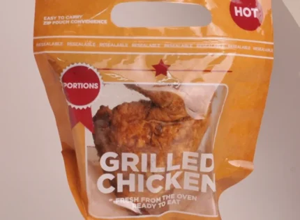 Tempting grilled chicken portion in a resealable and microwave-safe package marked 'HOT' from www.jcpackaging.net.