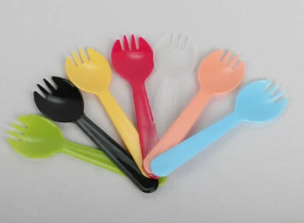 "Assorted colorful Twistix Spork Set from www.jcpackaging.net featuring innovative fork-spoon hybrid design for versatile use."