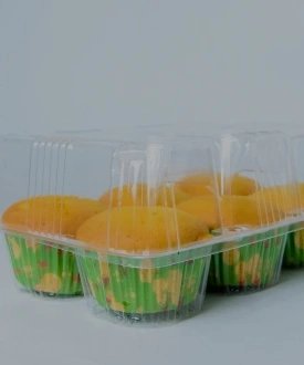 "Golden muffins in a clear quality premium packaging by JC Packaging, offering a peek into the freshness and flavor. Satisfy your sweet tooth at www.jcpackaging.net."