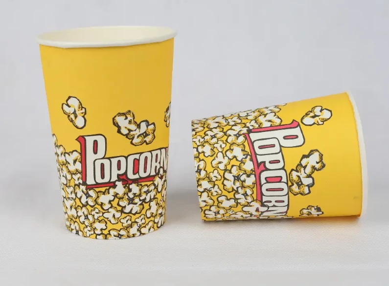 "Elegant yellow popcorn buckets with classic popcorn print, perfect for serving sizes, from www.jcpackaging.net."