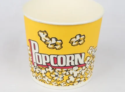 "A large 70oz yellow popcorn bucket from www.jcpackaging.net, ready to hold your snack-time treasures."