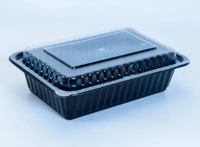 "Close-up of JC Packaging's single compartment meal box with a clear lid, embodying a modern and clean design ideal for food packaging."