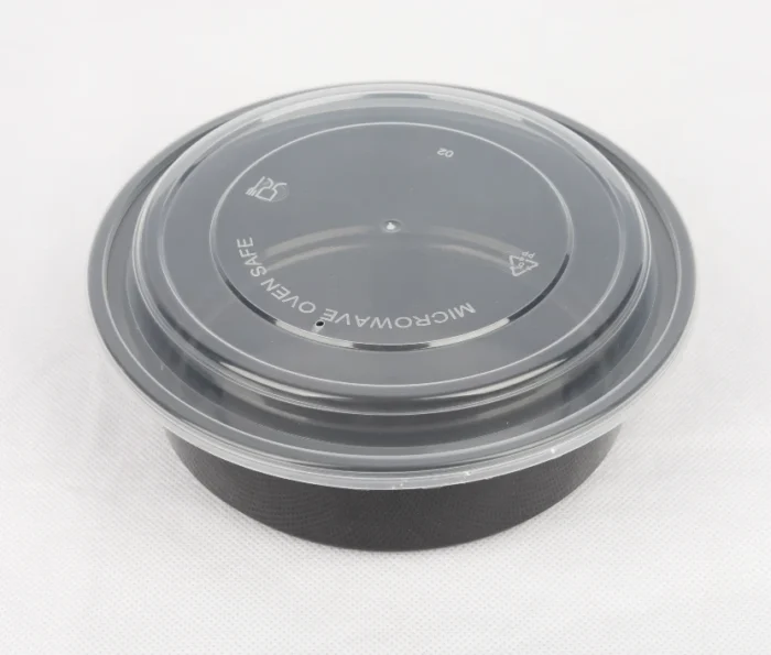 "Durable round food storage container with secure lid, showcasing microwave-safe symbol, from JC Packaging."