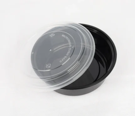 "Open round food storage container with clear lid from JC Packaging, designed for convenient microwave use."