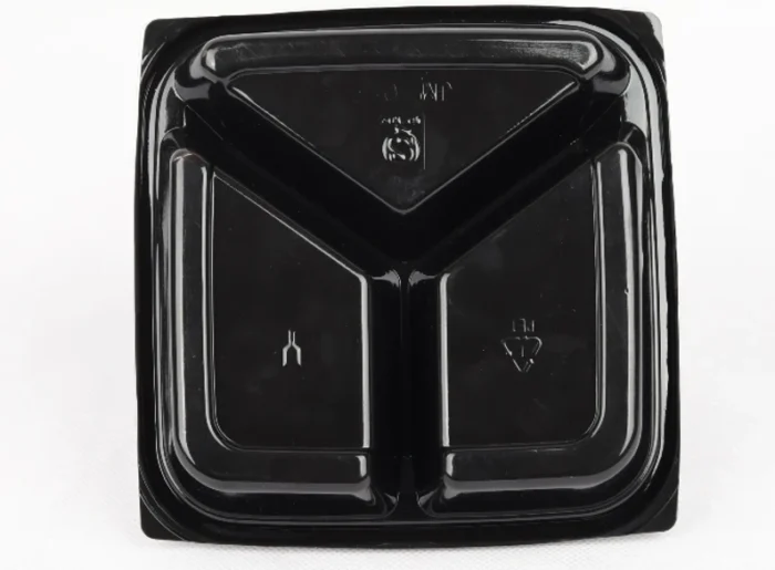 "Elegant black three-compartment food container from JC Packaging designed for stylish and efficient food organization."