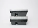 "Stacked 2-compartment plastic plates with clear lids from www.jcpackaging.net"